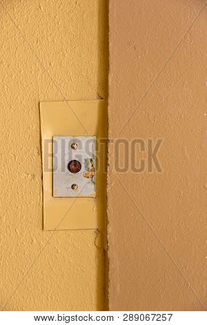 Old Elevator Call Button With Grungy Pattern In A Soviet Building In Post-soviet Riga, Latvia