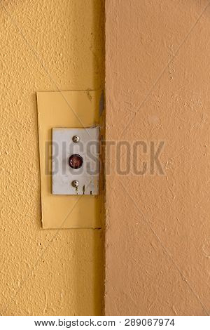 Old Elevator Call Button With Grungy Pattern In A Soviet Building In Post-soviet Riga, Latvia