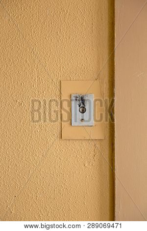 Old Elevator Call Button With Grungy Pattern In A Soviet Building In Post-soviet Riga, Latvia