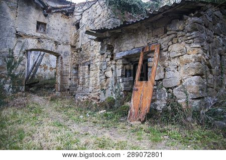 Abandoned House Overgrown With Poison Ivy In An Abandoned Village Slapnik In Region Goriška Brda, Sl