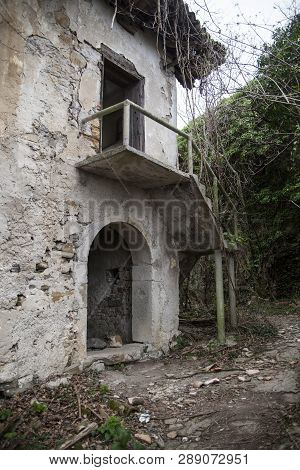 Abandoned House Overgrown With Poison Ivy In An Abandoned Village Slapnik In Region Goriška Brda, Sl