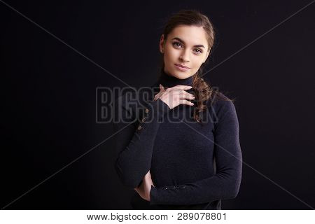 Beautiful Smiling Woman Posing At Isolated Black Background