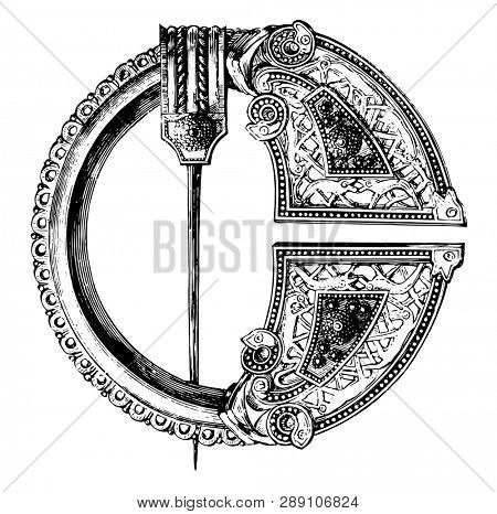 Royal Tara Brooch is made out of bronze with niello, vintage line drawing or engraving illustration.