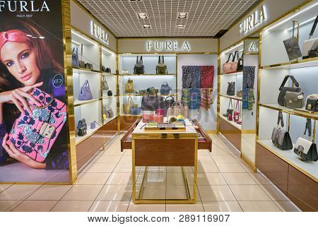 LINATE, ITALY - CIRCA NOVEMBER, 2017: bugs on display at Furla shop in Milan Linate Airport.