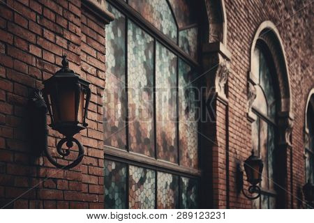 Road lamp and wall window patterns in Xiahao Old street in Chongqing, China.