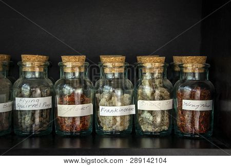 Bottles filled with strange things for Chinese Herbology  - READ the labels