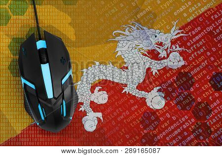 Bhutan Flag  And Computer Mouse. Digital Threat, Illegal Actions On The Internet