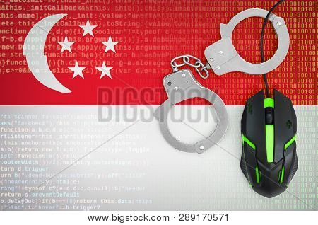 Singapore Flag  And Handcuffed Computer Mouse. Combating Computer Crime, Hackers And Piracy