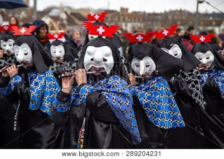 Basel, Switzerland - March 11, 2019: Participants At The Parade Of The Carnival Of Basel 2019. The C