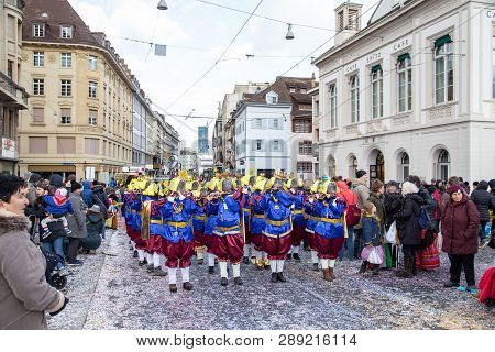 Basel, Switzerland - March 11, 2019: Participants At The Parade Of The Carnival Of Basel. The Carniv