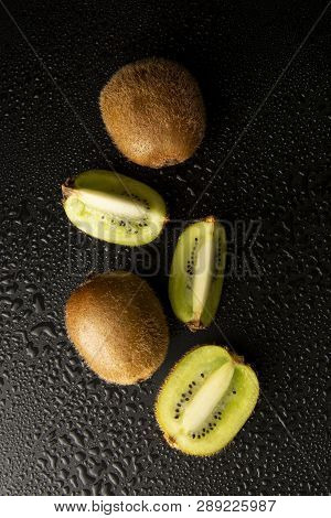 Kiwi Fruit Isolated On Black Background, Fresh Kiwi Fruit. Summer Vitamine Fruit. Healthy Food Or De
