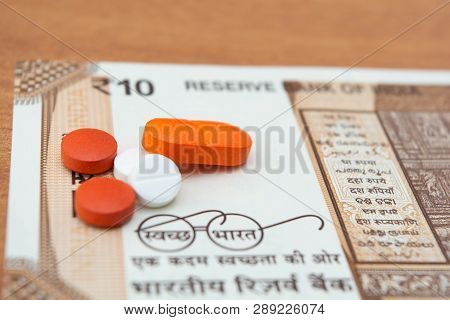 Concept Of The Affordable Medicine In India Due To Generic Drugs On Indian Currency Notes As Backgro