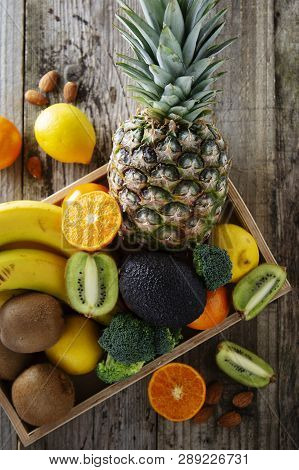 Fruits- Pineaple, Tangerine, Orange, Citrus Fruits, Kiwi, Broccoli. Healthy Food Lose Weigh Fruits A