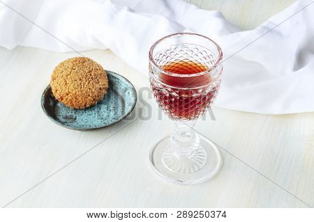 A Glass Of Sweet Wine With A Cookie And Copy Space