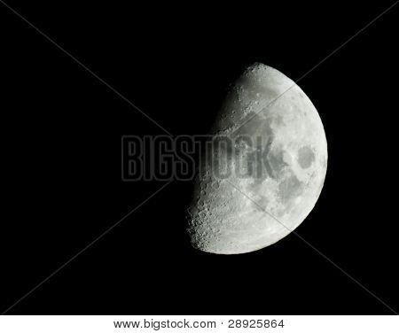 Half moon isolated on the blackness of the space