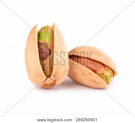 Pistachio Torn To Pieces With Whole Pistachio Isolated On White