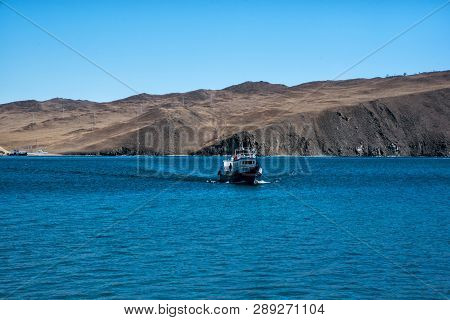 Sakhurta, Russia - May 1, 2018: Ferry Is Coming From The Island Of Olkhon. Lake Baikal. The Strait I