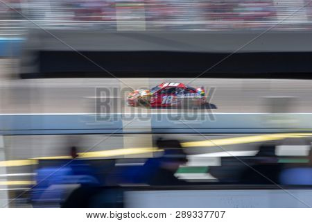 March 10, 2019 - Avondale, Arizona, USA: Kyle Busch (18) battles for position for the Ticket Guardian 500 at ISM Raceway in Avondale, Arizona.