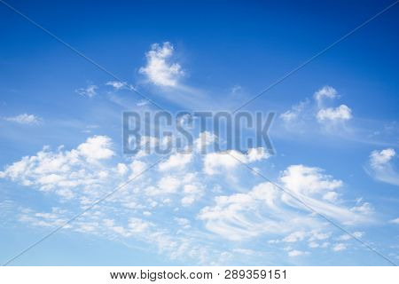 Beautiful White Clouds On A Blue Sky Background. Clouds Like A Brush Strokes