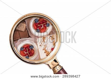 Cake In The Magnifying Glass. Food Composition Analysis Concept.