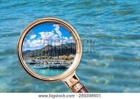 View Of The Greek Port Of Nidri In The Magnifying Glass. Creece. Conccept