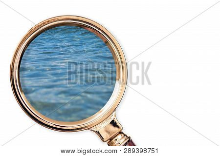 Texture Of Sea Water In The Magnifying Glass. Summer Concept