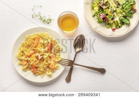 Pasta And Wine, Italian Dinner. Farfalle With Smoked Salmon And Cream Sauce, Shot From The Top With 