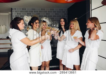 Beautiful And Positive Bide Mades Having Fun On Hen Party.