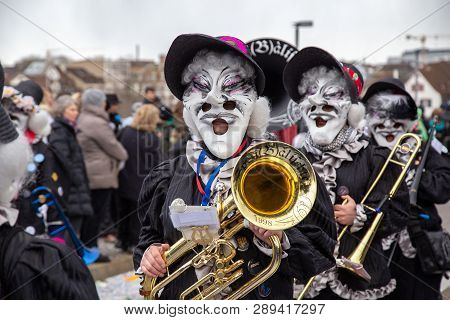 Basel, Switzerland - March 11, 2019: Participants At The Parade Of The Yearly Carnival Of Basel. The