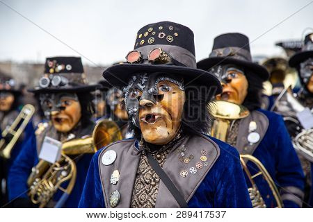 Basel, Switzerland - March 11, 2019: Participants At The Parade Of The Yearly Carnival Of Basel. The
