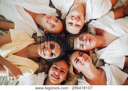 Beautiful And Positive Bide Mades Having Fun On Hen Party.