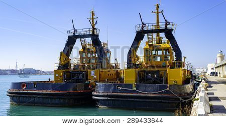 Two Tugs Boat Stands Ready To Help Ships In The Port Of Bari