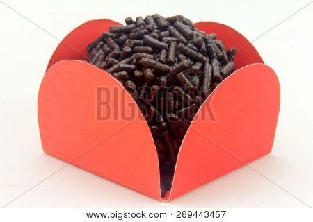 Brigadeiro (brigadier), Chocolate Sweet Typical Of Brazilian Cuisine Covered With Particles, In A Wh