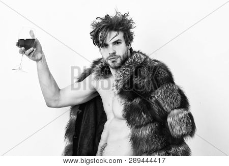 Guy Attractive Rich Posing Fur Coat On Naked Body. Rich Athlete Enjoy His Life. Fashion And Pathos. 