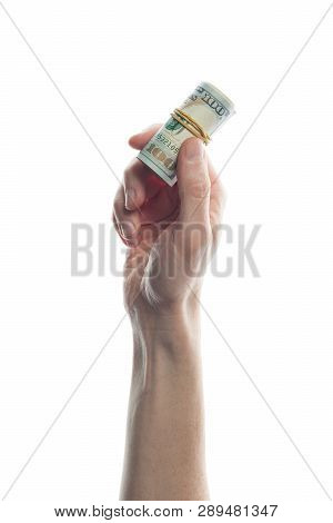 Man Hand Holding 100 Dollar Bills Isolated On White. Roll Of Us Dollars Ban Knote