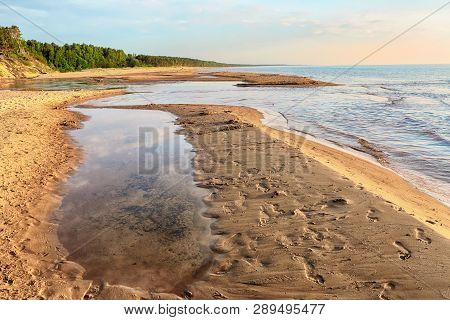 Sunset At The Beach Saulkrasti, Located Near The Latvian Capital Riga. The View Of The Rigas Bay.