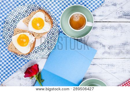 Flowers, Two Cups Of Aromatic Coffee And Heart-shaped Toasts For A Romantic Morning Of Lovers. Red R