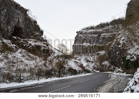 Road Running Through Cheddar Gorge On A Snowy Day
