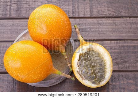 Passion Fruit Granadilla On The Table - Passiflora Ligularis