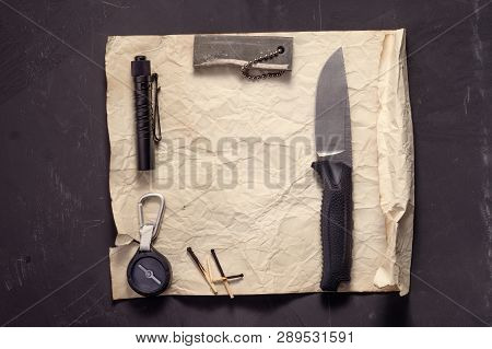Survival kit. Alert. Writing a letter. Top view on a latter.