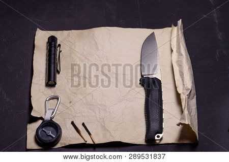 The hunter writes a letter. Urgent letter. Request for help. View at an angle.