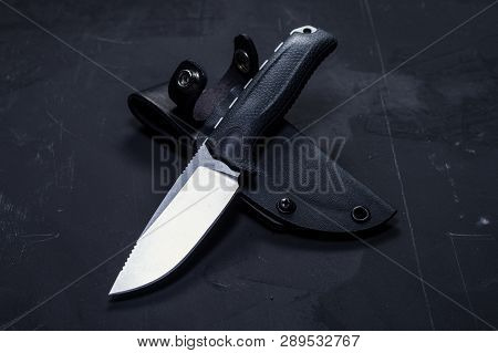 Skinner knife. Skinner with plastic sheath. Isolate a fixed knife.