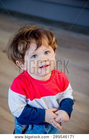 Little Todler Boy Stay At Kitchen In A Day And Watiching Something