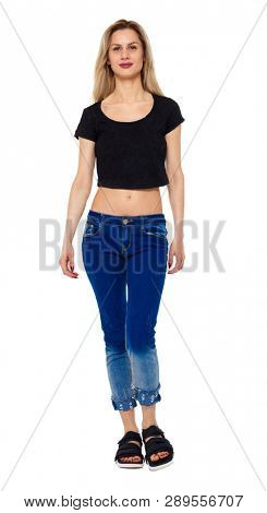 Front view of walking woman. beautiful girl in motion. frontside view of person. people collection. Isolated over white. Portrait of a smiling girl in summer clothes.