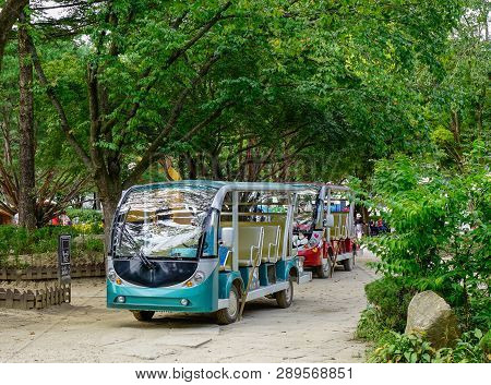 Nami, South Korea - Feb 6, 2015. Electric Carts Waiting For Passengers In Front Of The Botanic Garde