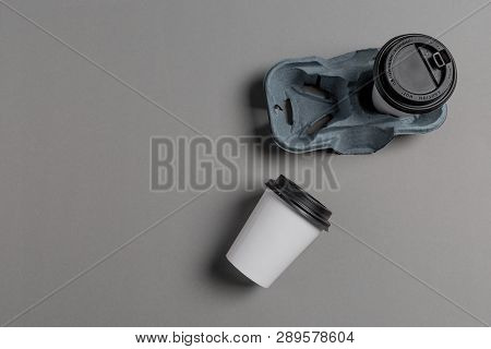 Two Coffee To Go On Gray Background