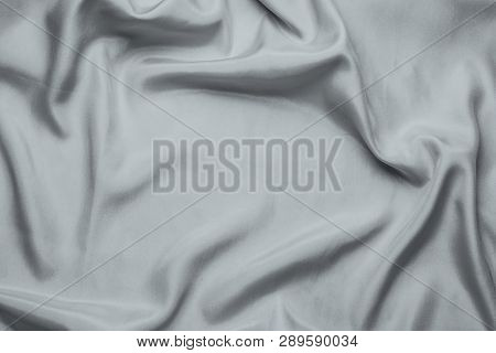 Smooth Silk Fabric Or Statin Gray With Waves, Can Be Used As Background Or Wallpaper