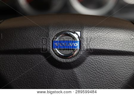 Novosibirsk, Russia - 08.01.18: Interior View With Steering Wheel And Emblem Of Black Volvo S60 Car 