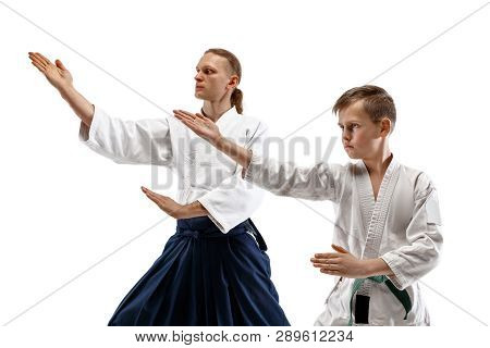 Man And Teen Boy Fighting At Aikido Training In Martial Arts School. Healthy Lifestyle And Sports Co