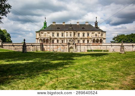 Exterior On The Podgoretsky Castle Of General Access In Ukraine In The Summer On A Clear Day With Bl